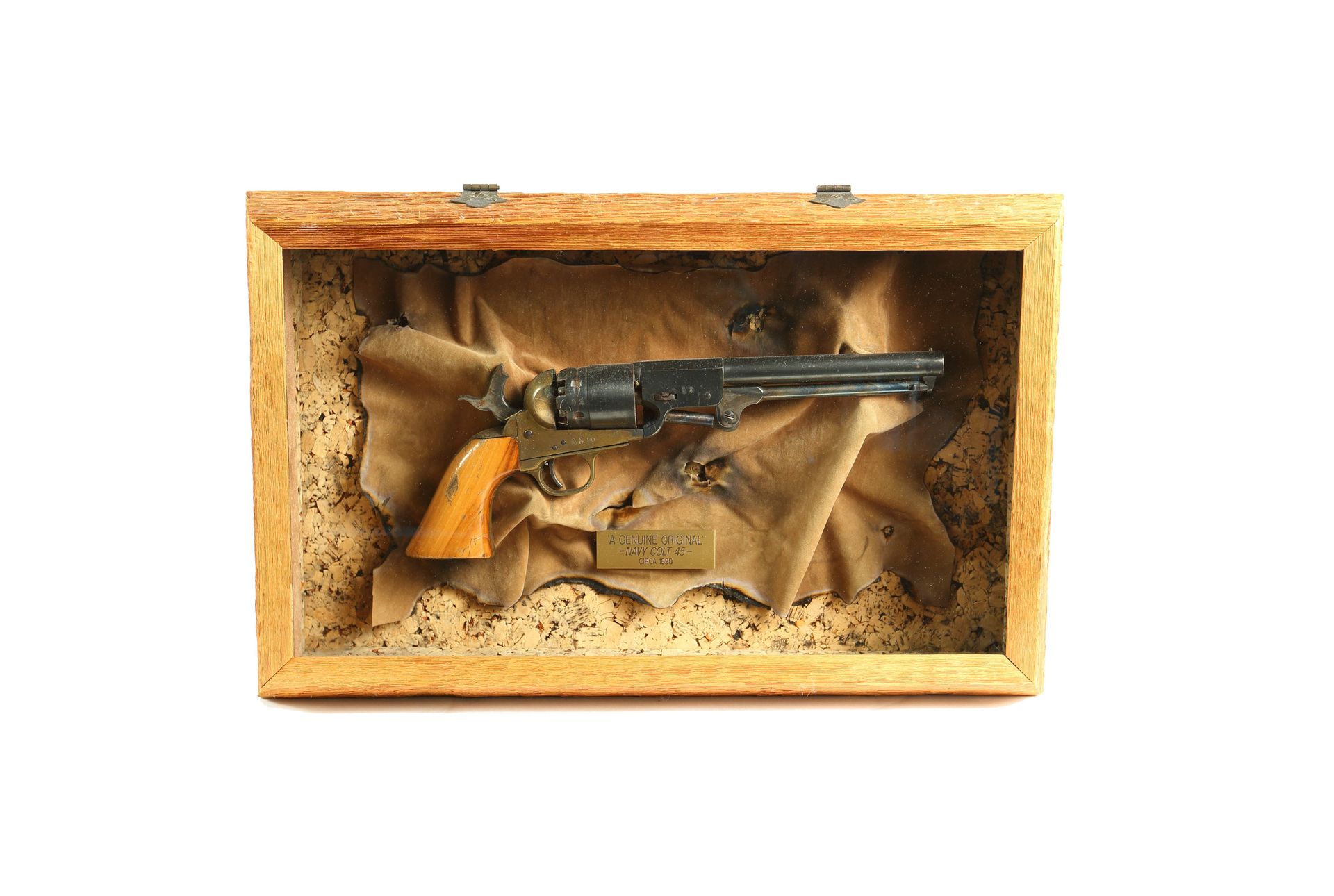 Antique Navy Colt .45 revolver, circa 1890, preserved in a wood and cork-lined shadow box